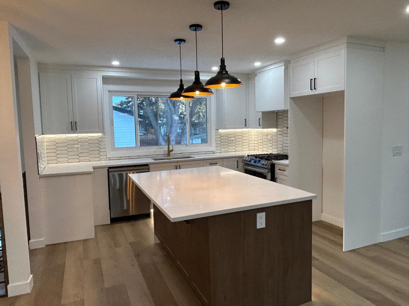 Modern kitchen renovation by Sturdy Construction Services